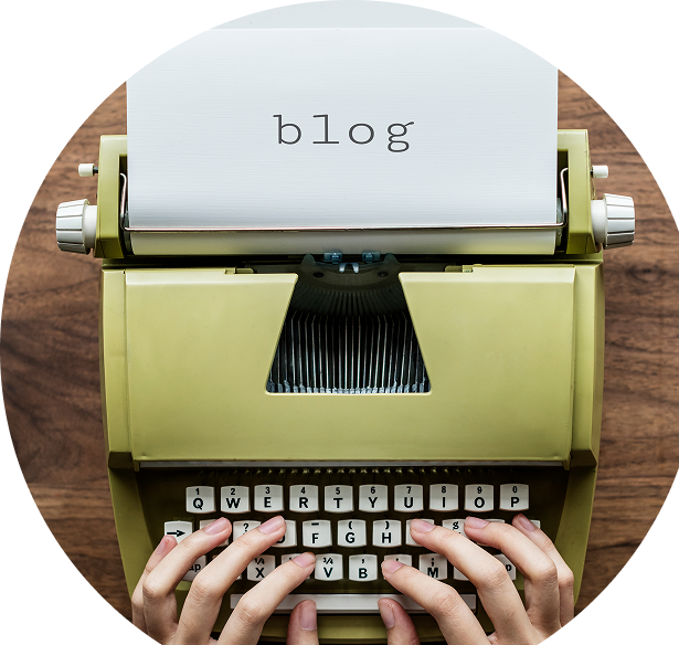 Person typing on laptop keyboard